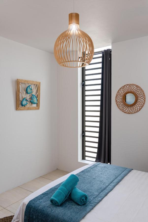 West Wood Holiday Apartment, C6 - Flic En Flac With Pool At A Quiet Location, Beautifully Decorated And Close To The Beach Eksteriør bilde